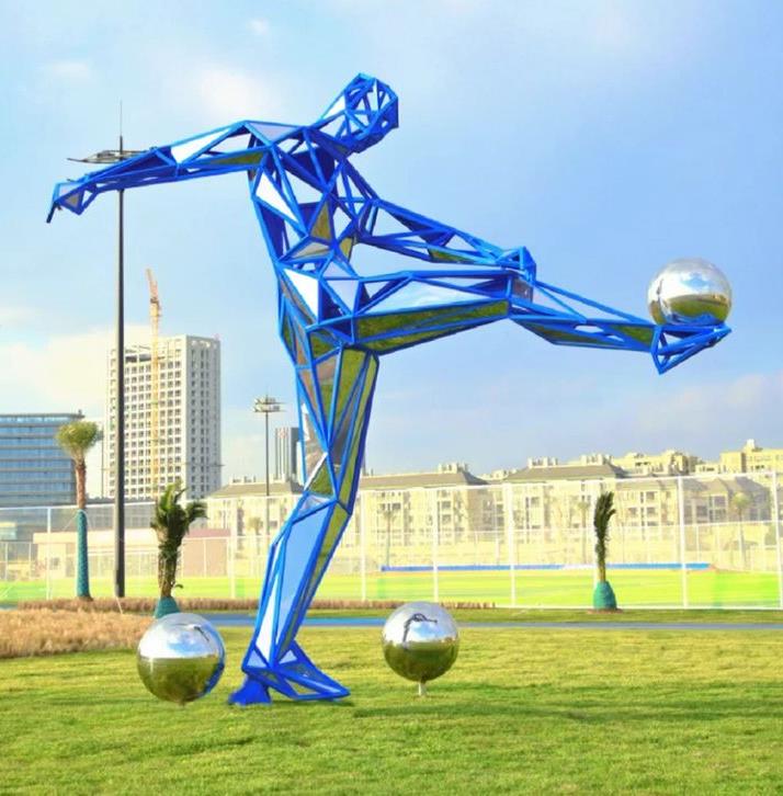Blue geometric footballer sculpture proposed for Football Ground Circle